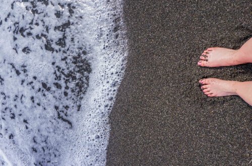 Black sand beach of Naples, Italy